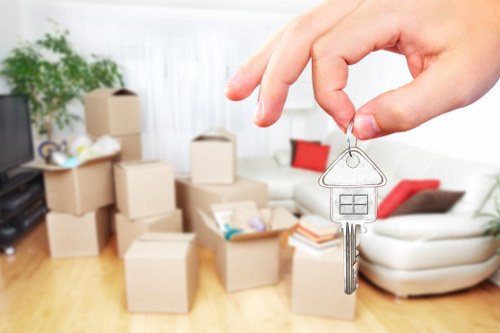 Removal van loading household furniture for a Harrow move