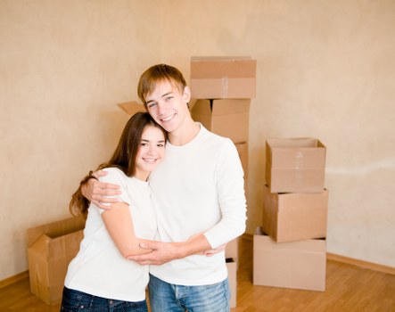Packing fragile household items for a move in Harrow