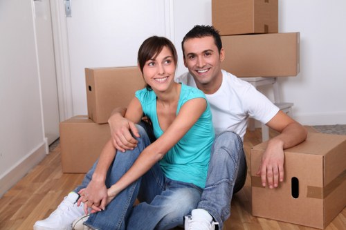 Local movers preparing boxes for a flat in Harrow