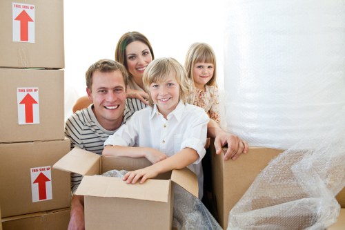 Loading furniture into a moving truck for a local Harrow relocation