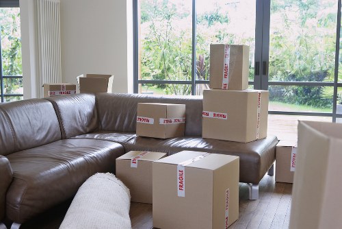 A trained moving team handling furniture carefully